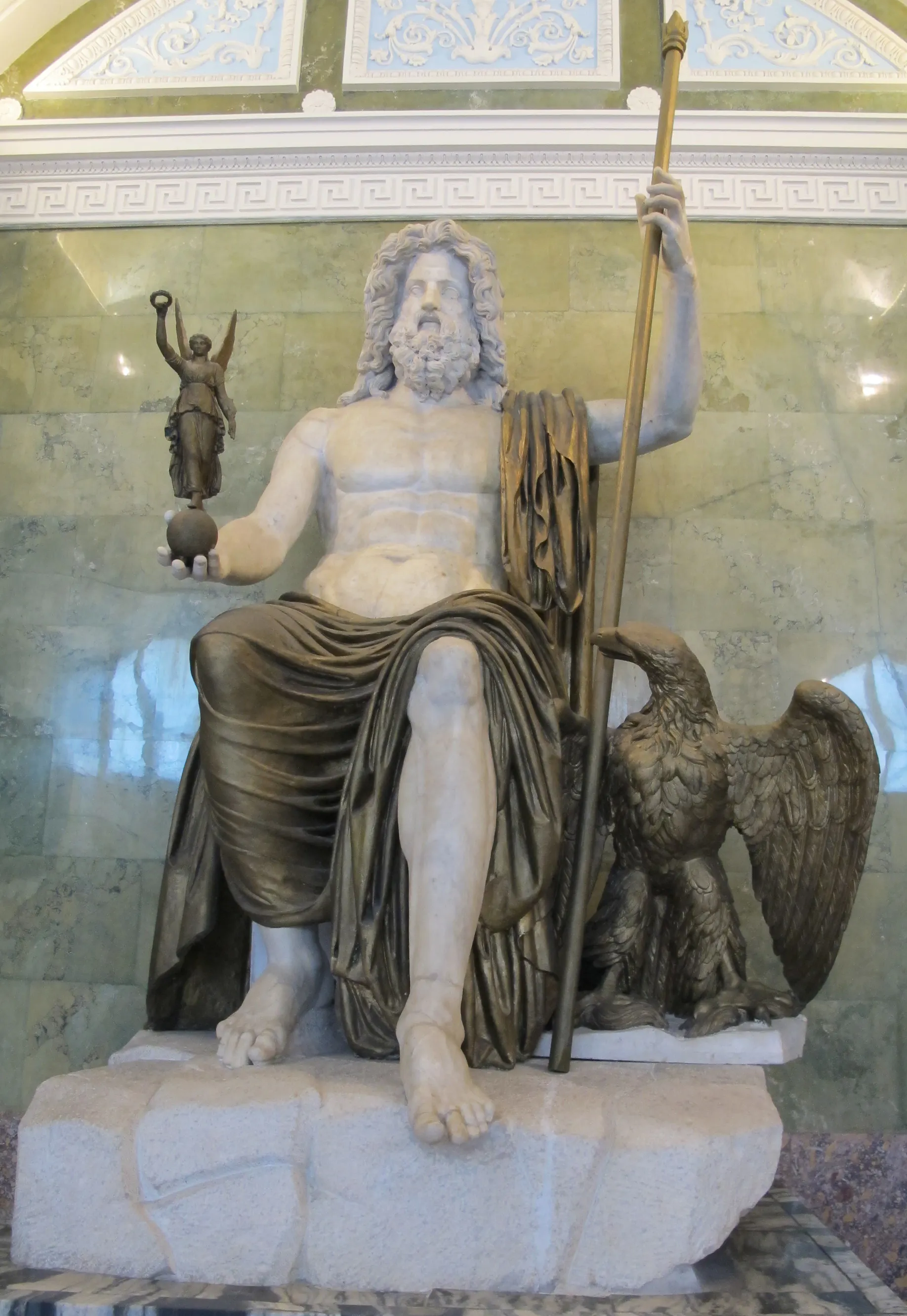 A first-century CE statue of Jupiter, with modern bronze-like additions, makes visible the distinction Vairo presses.