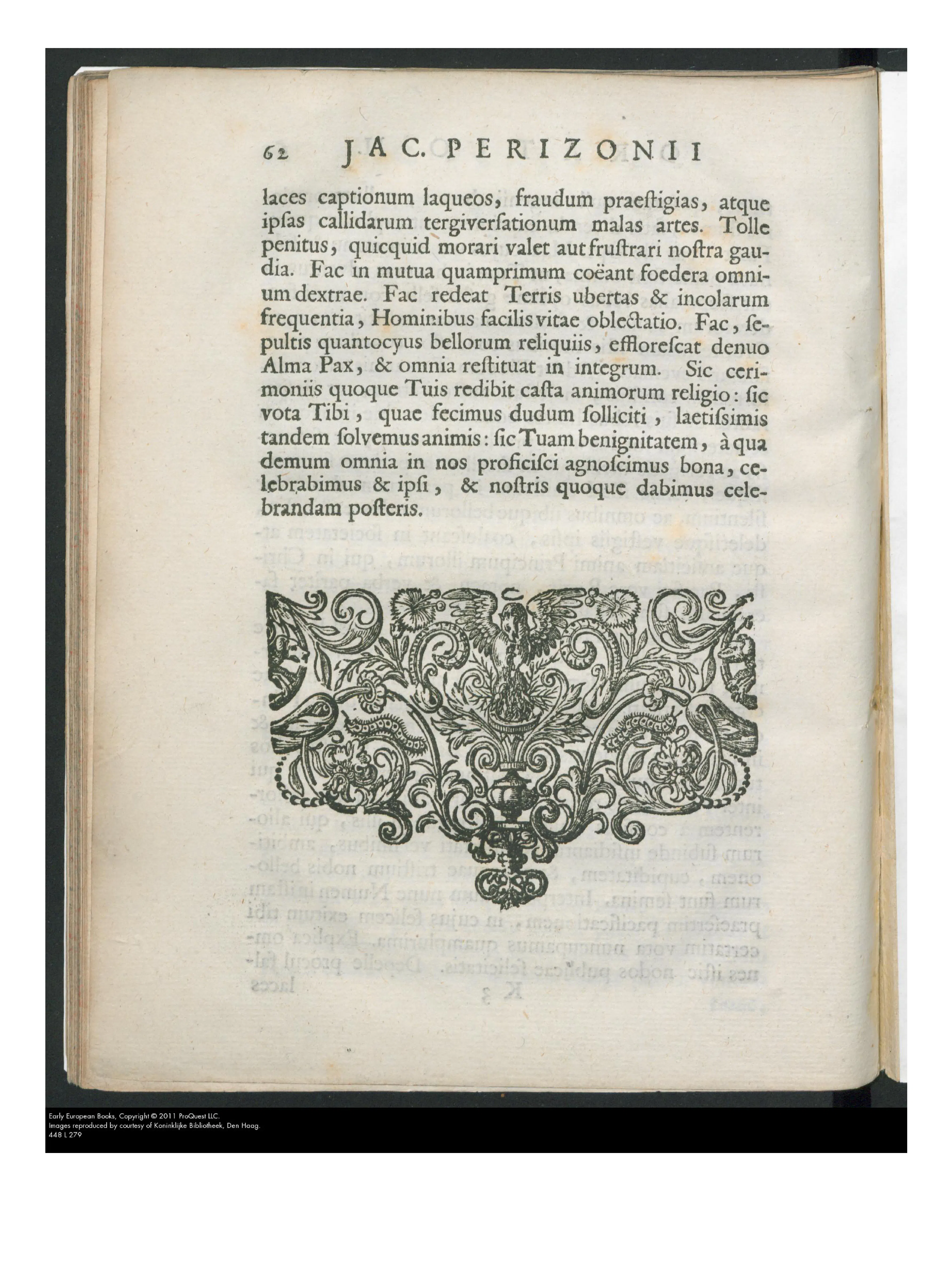 The final printed page of the Cohortatio, where the closing prayer asks that Peace flourish anew (“efflorescat denuo”) and restore all things “in integrum,” borrowing the language of legal restitution. A woodcut tailpiece of scrollwork, birds, masks and a central urn seals the quarto.