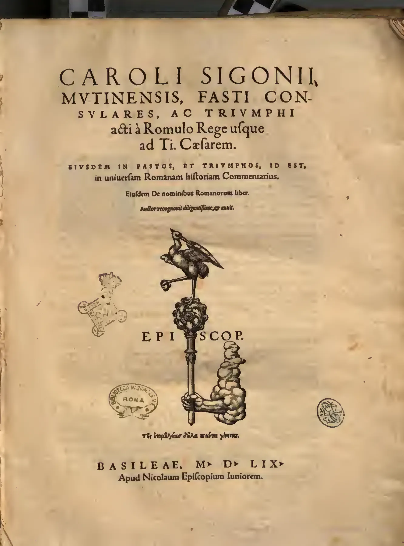 Sigonio’s Basel title page announces the volume’s three-part architecture: the consular and triumphal fasti, a commentary on Roman history, and a treatise on names. Bearing Nikolaus Episcopius the Younger’s device, the 1559 imprint places this author-revised reissue firmly within the transalpine orbit of the former Froben press.