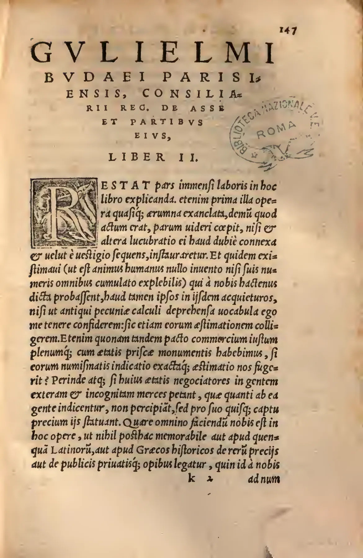 At the opening of Book II, the spaced-capital heading naming Budé royal councillor and the decorated initial mark the moment when De asse moves beyond recovered coin-names to the harder problem of their valuation.