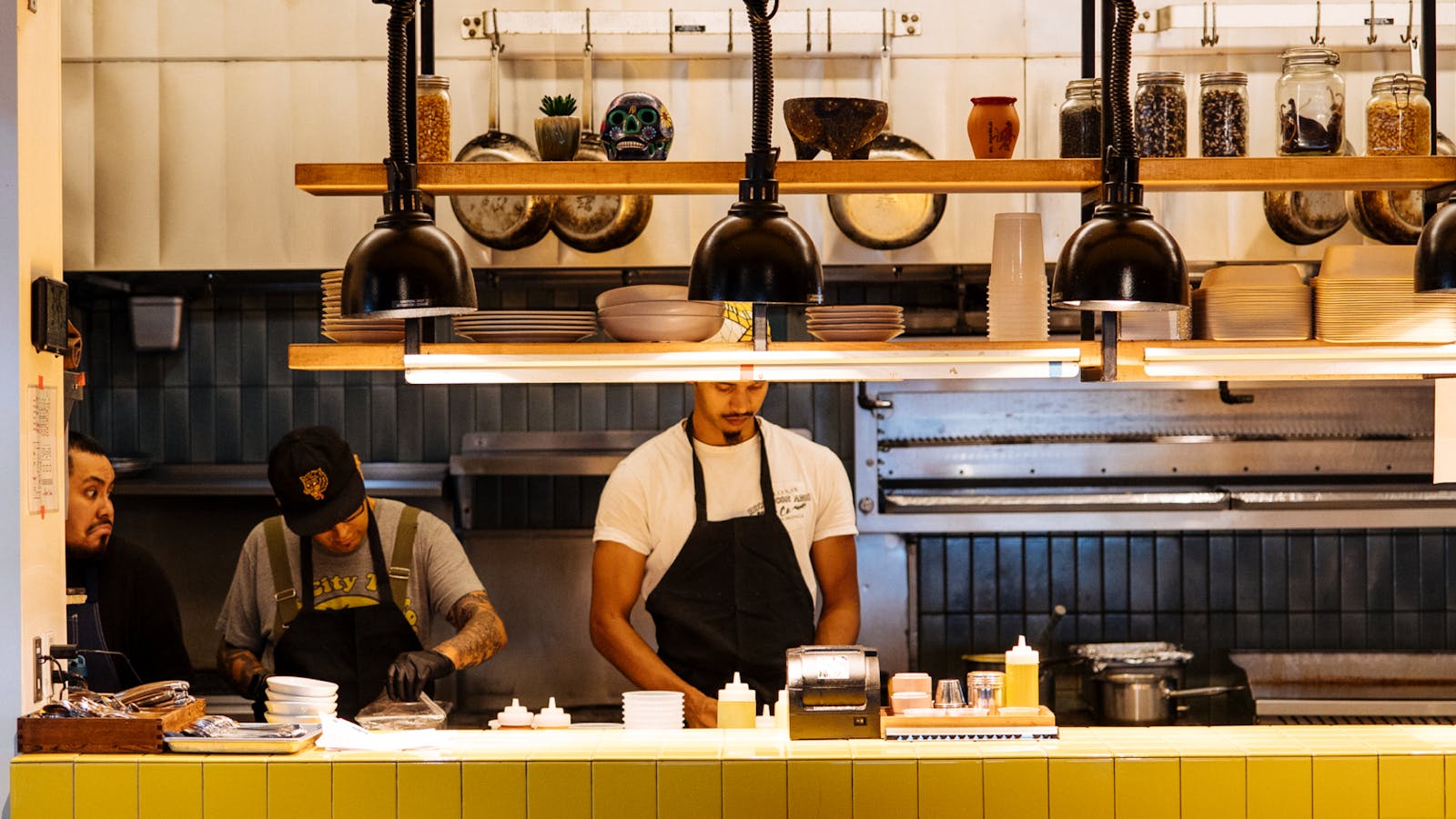 Kitchen staff working at a restaurant. 