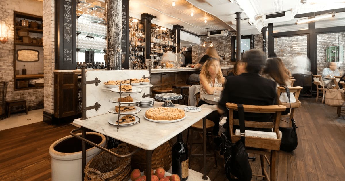 People dining at Via Carota in NYC. 