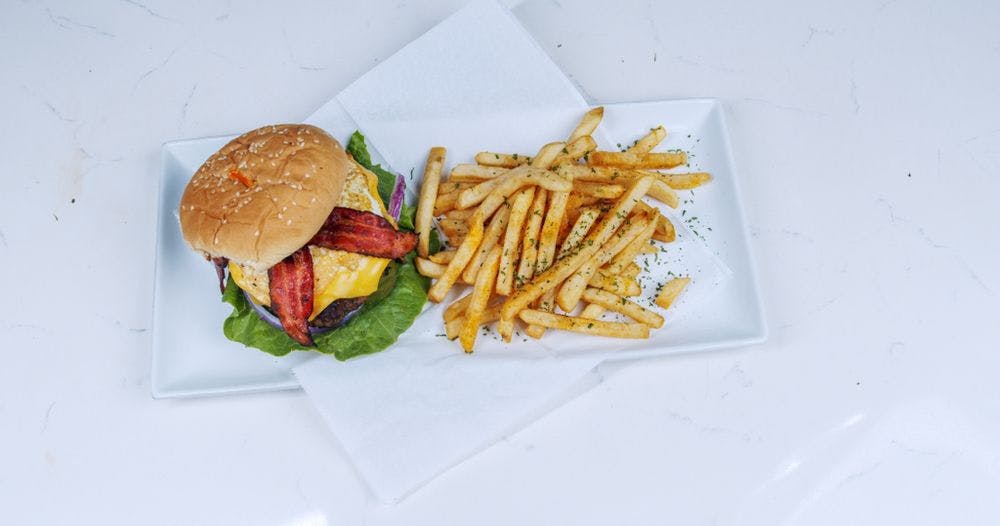 A cheeseburger and fries at A'dor Kitchen & Cocktail.