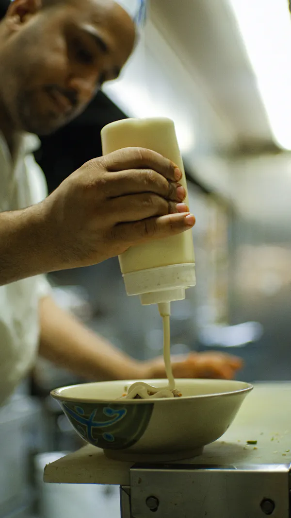 A chef preparing a mean at Yemen Cafe in New York City. 