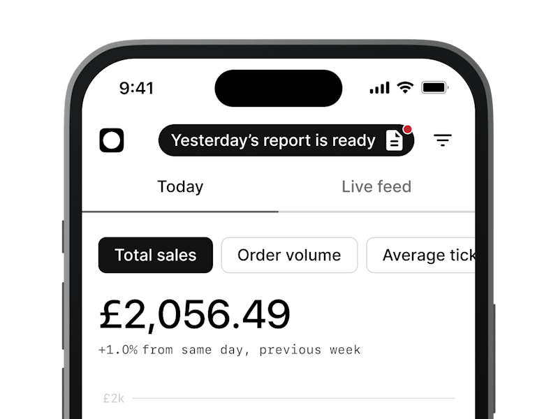 An image of the top half of a black mobile phone displaying Total sales on screen