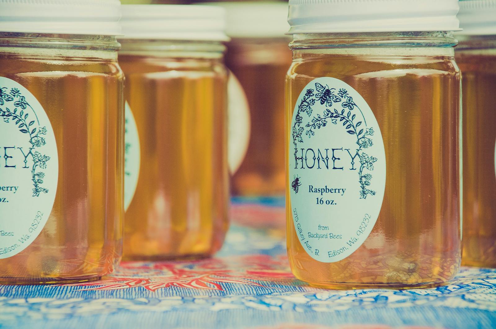 Several jars of honey. 