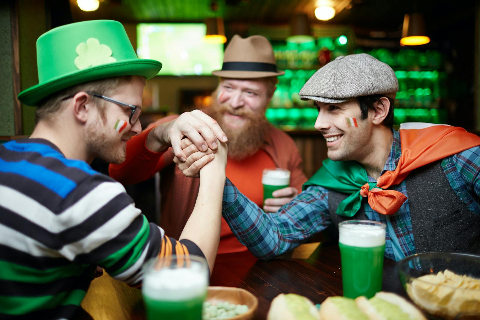 Customers enjoying eatertainment at a restaurant.