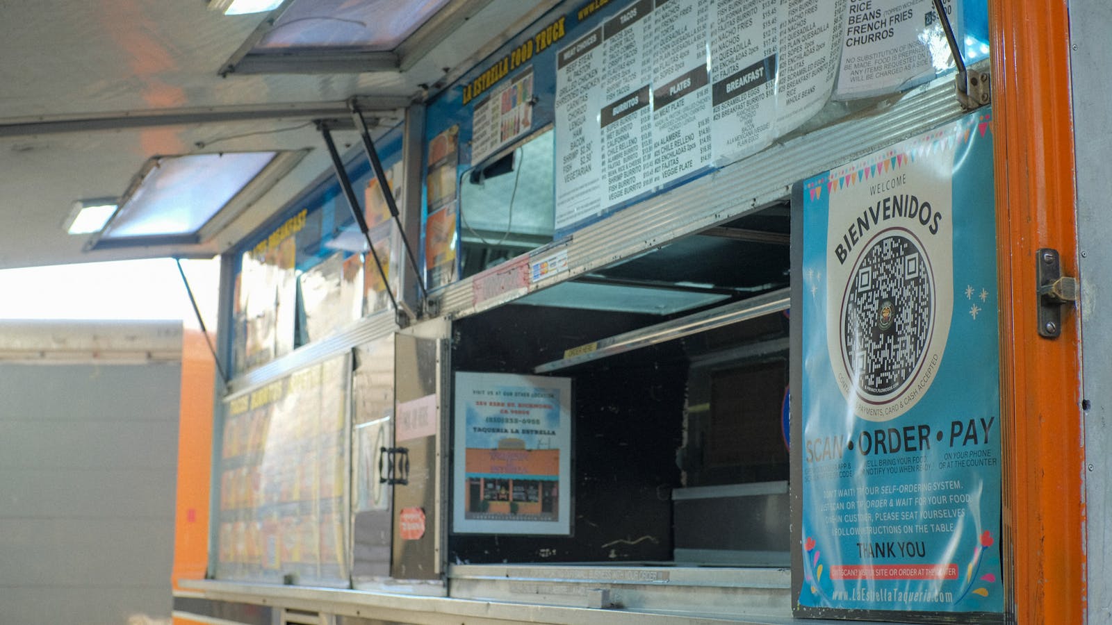 The outside of Taqueria La Estrella's food truck. 