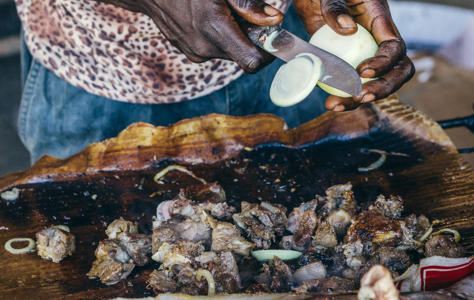 A meal being prepared in an African food truck.