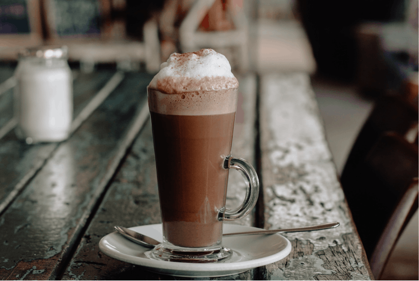 Image of a glass of hot chocolate with whipped cream