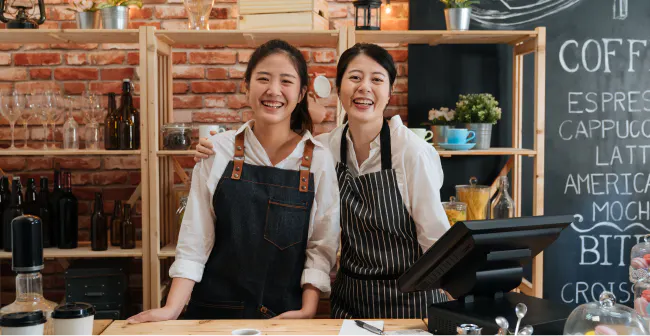 Image of two women working in a coffee shop