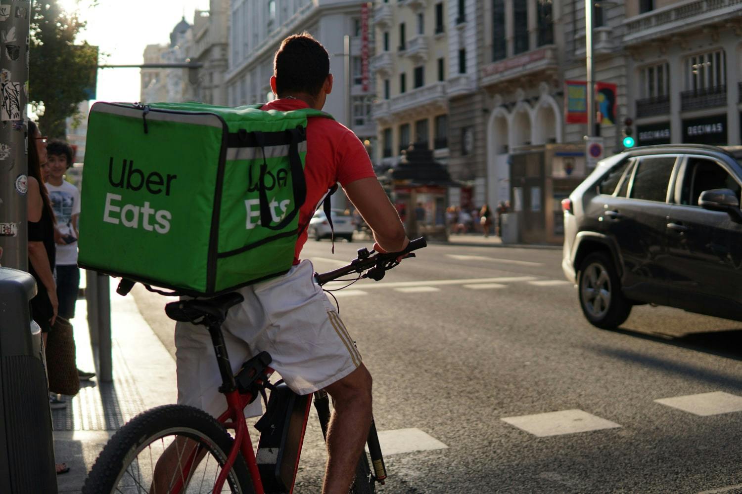 Image of a Uber Eats delivery rider on a bicycle