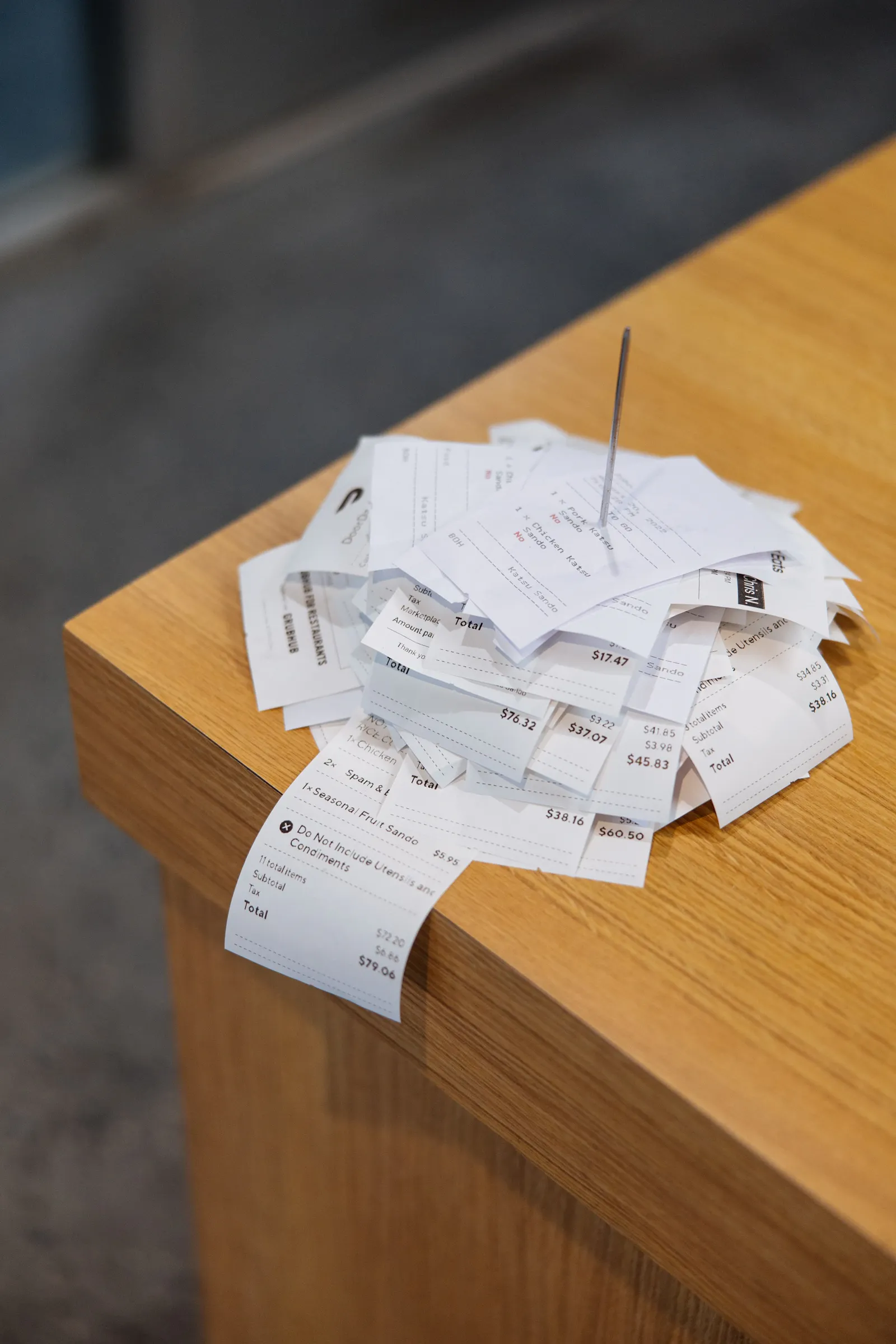 Delivery tickets at a restaurant in 2024.