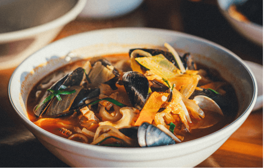 Image of a bowl of spicy seafood noodle soup