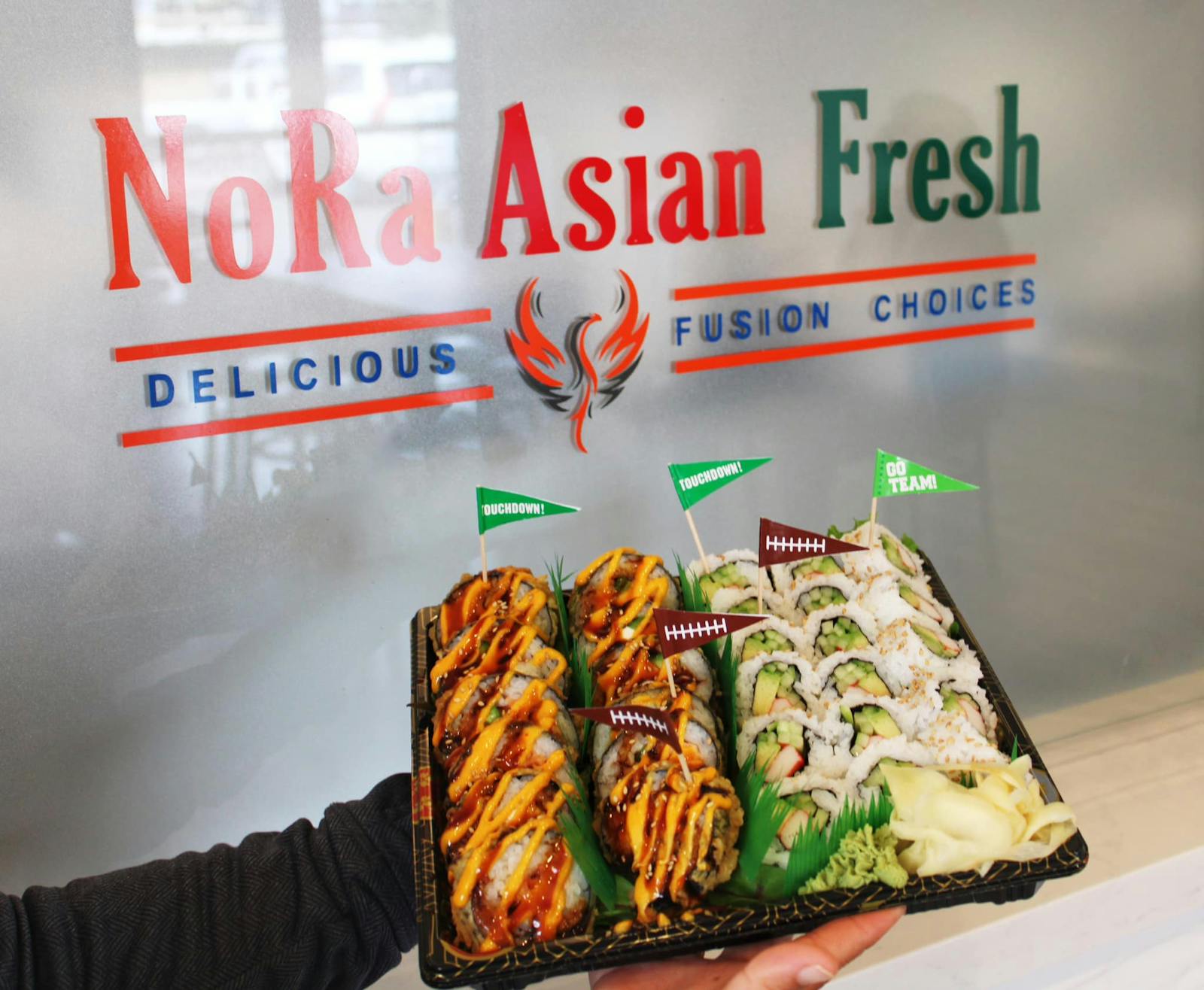 Plate of food at NoRa Asian Fresh restaurant window