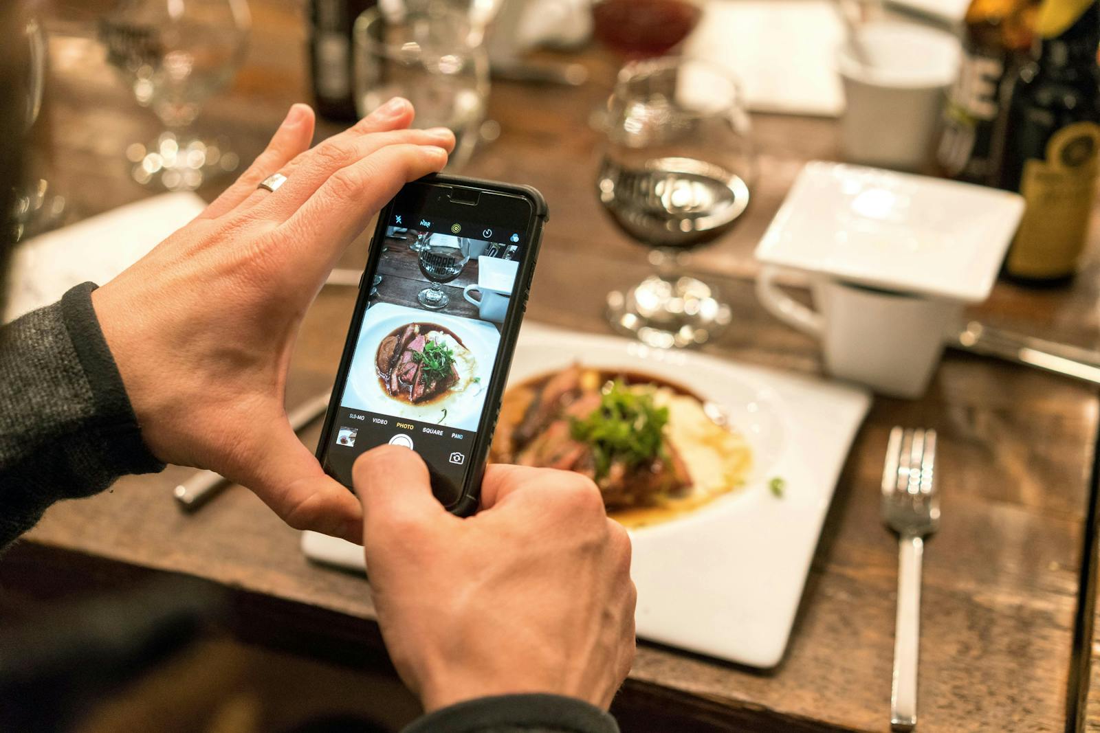 An Instagram Reel being taken at a restaurant. 