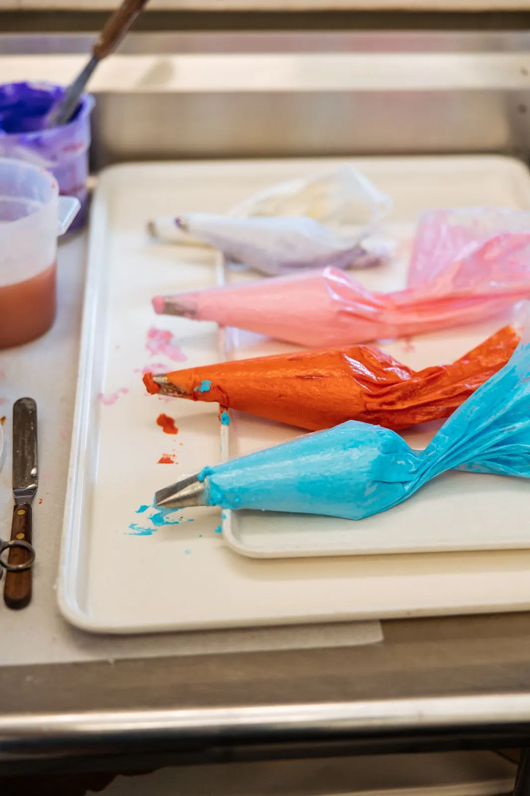 Frosting for Valentine's Day decorations at a restaurant.