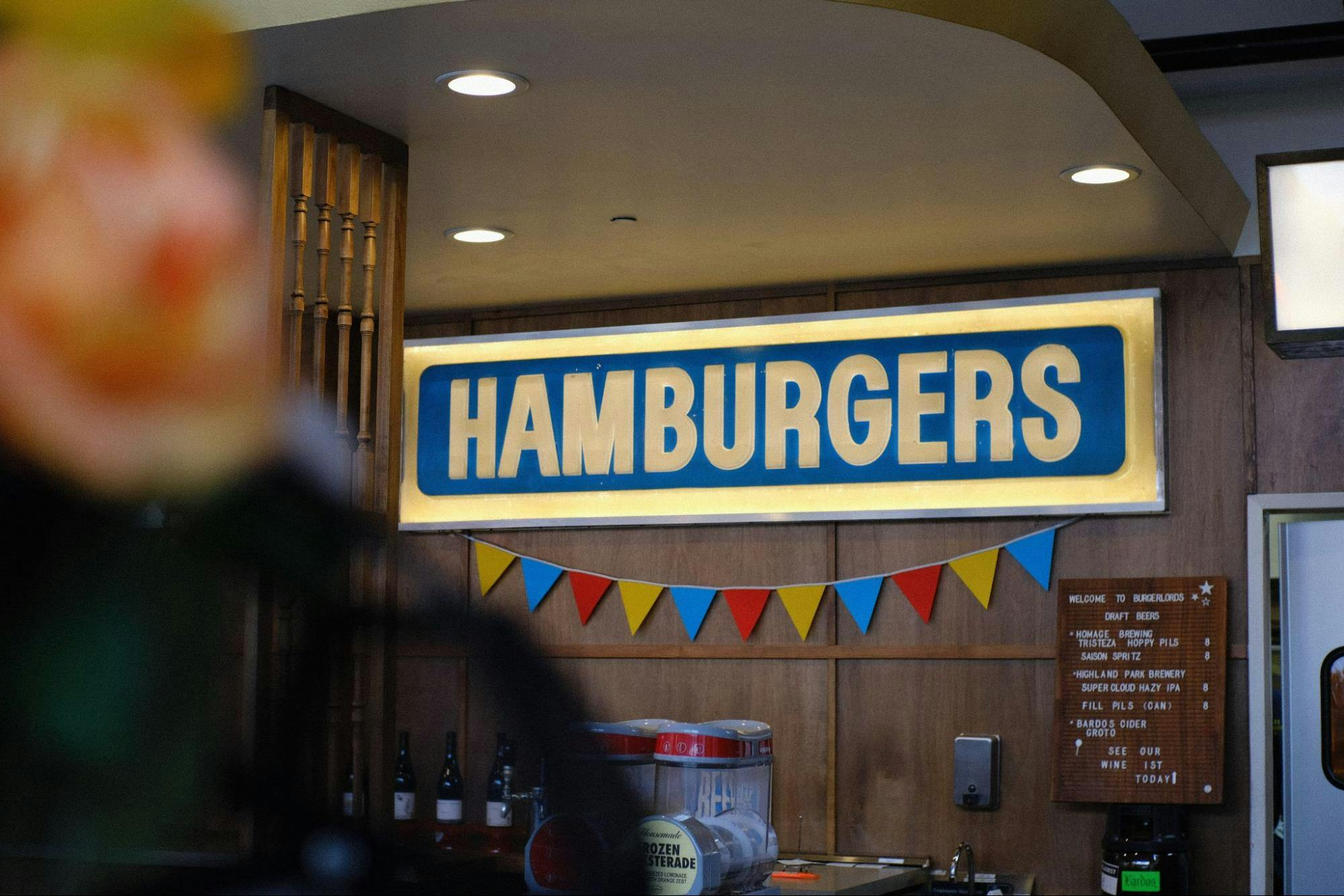 signboard with the word hamburgers