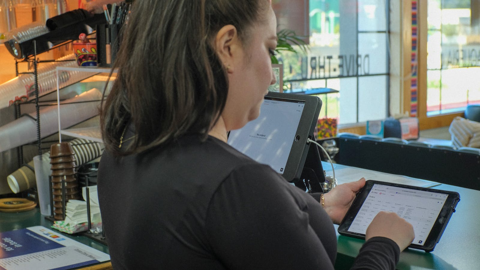 Otter's Restaurant Operating System being used by a restaurant staff member. 