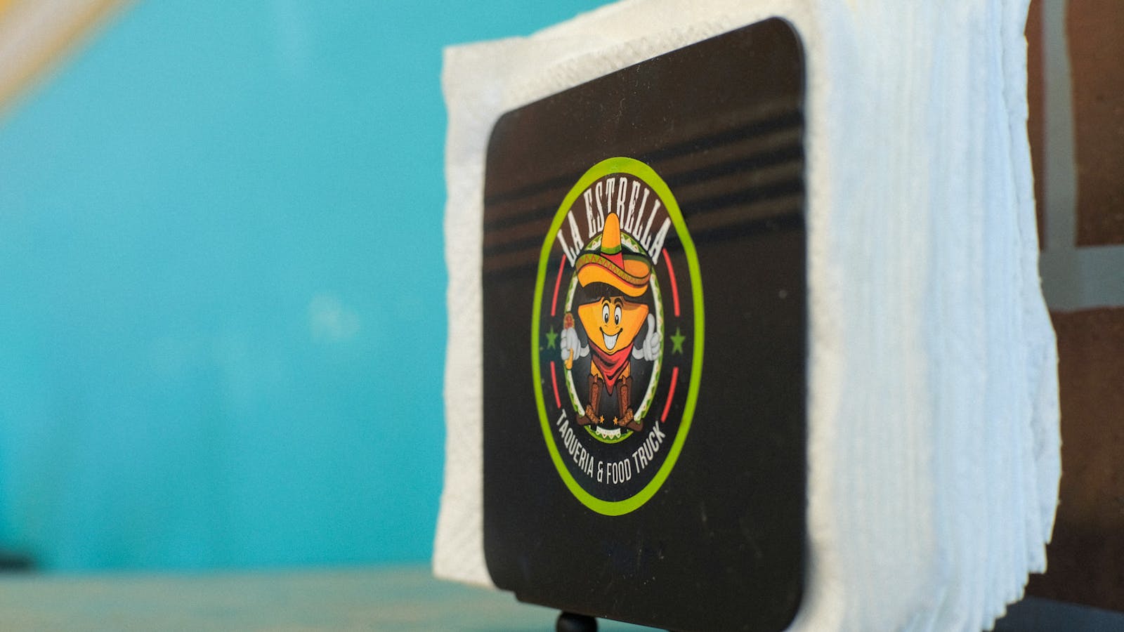 Taqueria La Estrella's logo.