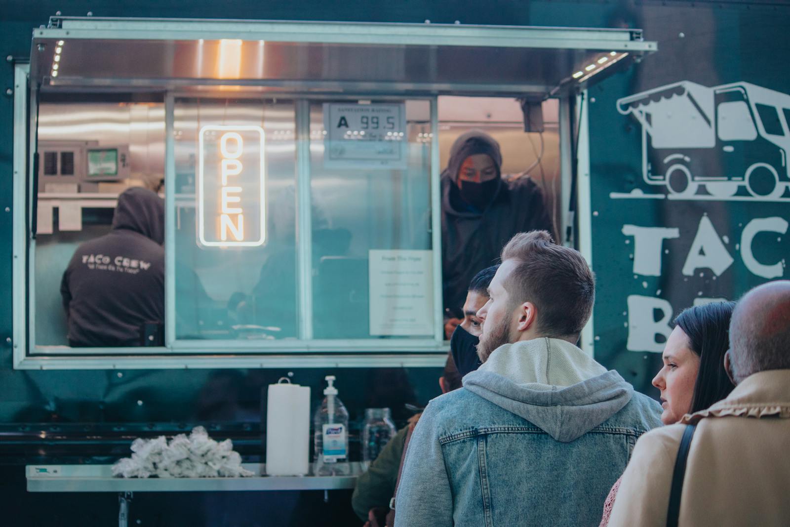 People lined up at a taco food truck in Austin, Texas.