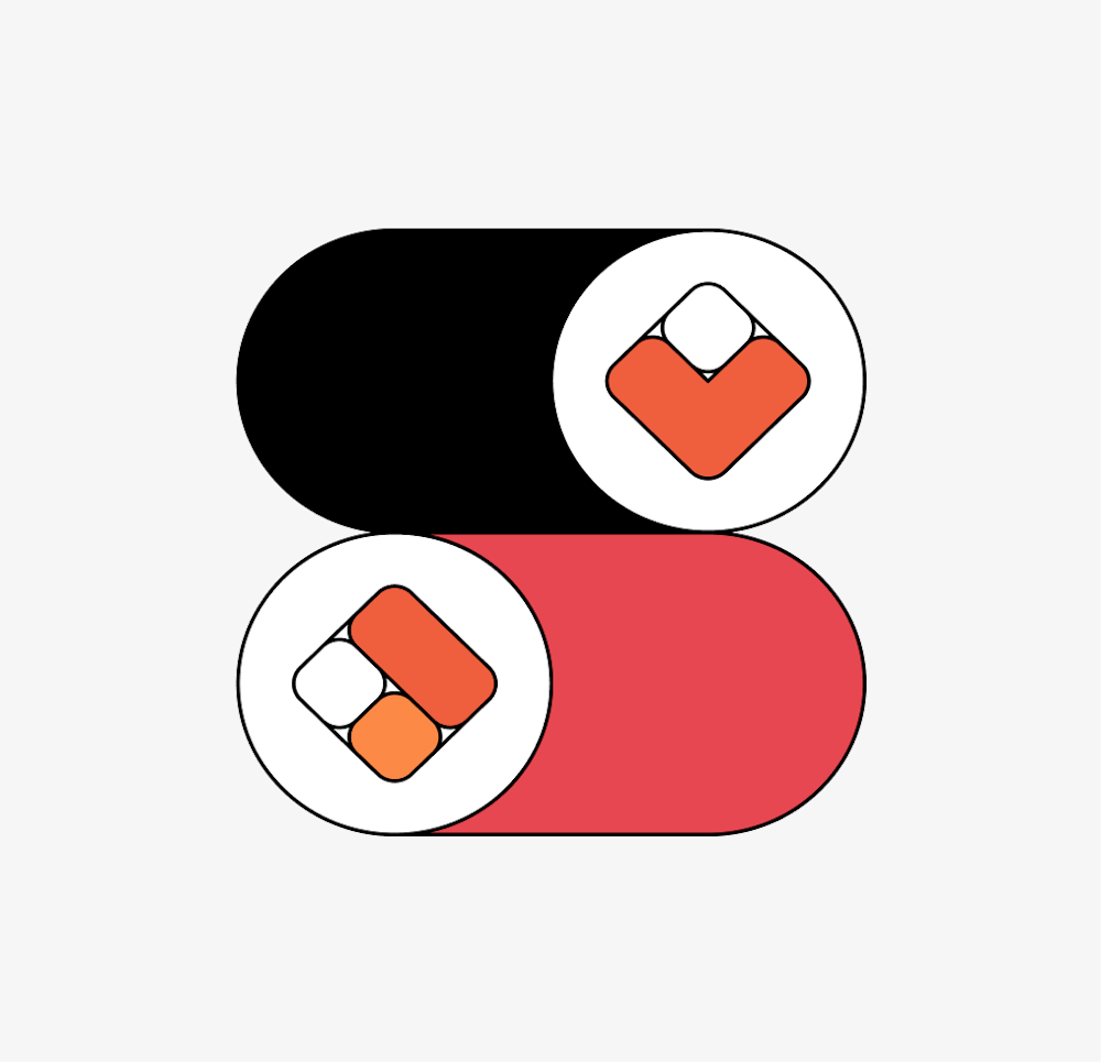 two multicolored toggles in black, white, orange, and red