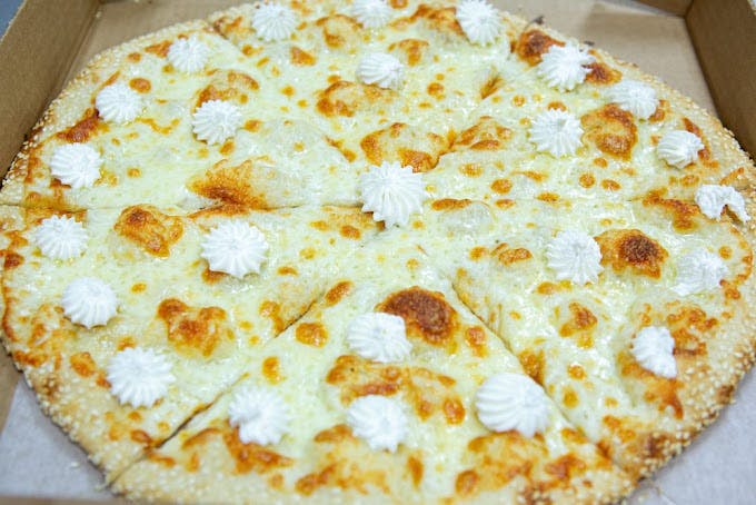 A five-cheese pizza from Amore Pizzeria.