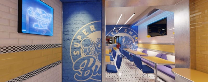 Vibrant restaurant interior with bold colors, graphic wall art, and modern seating that reflects a fun, personality-driven burger shop design