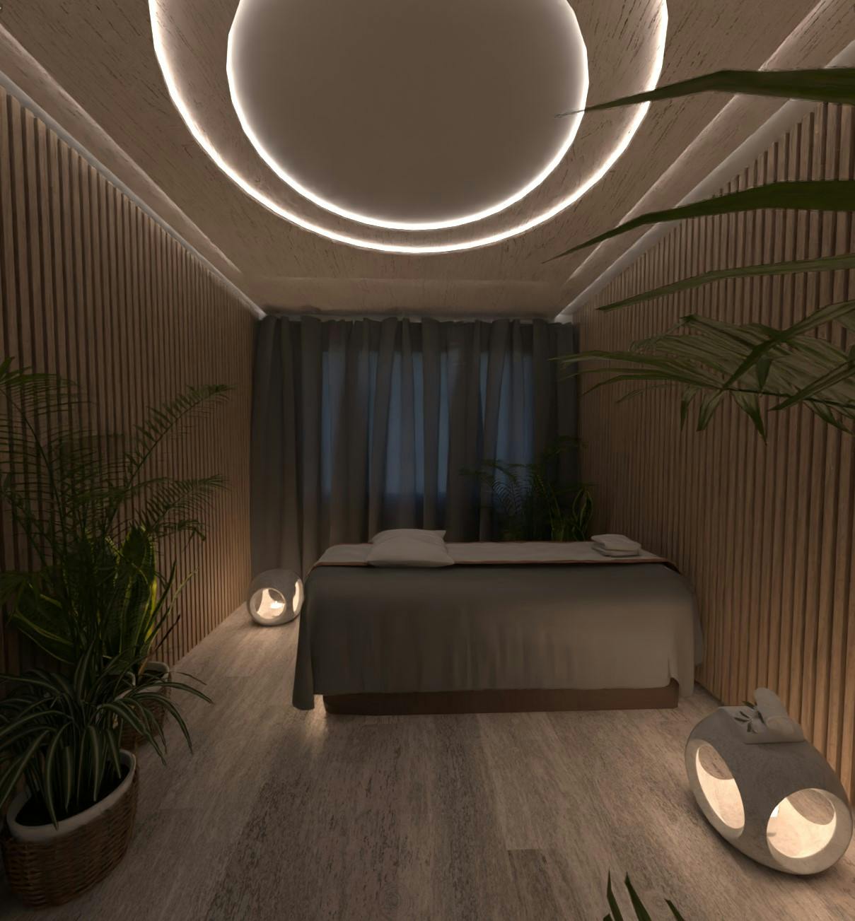 Private treatment room featuring a comfortable therapy bed, soothing neutral tones, and gentle lighting for a peaceful healing environment.