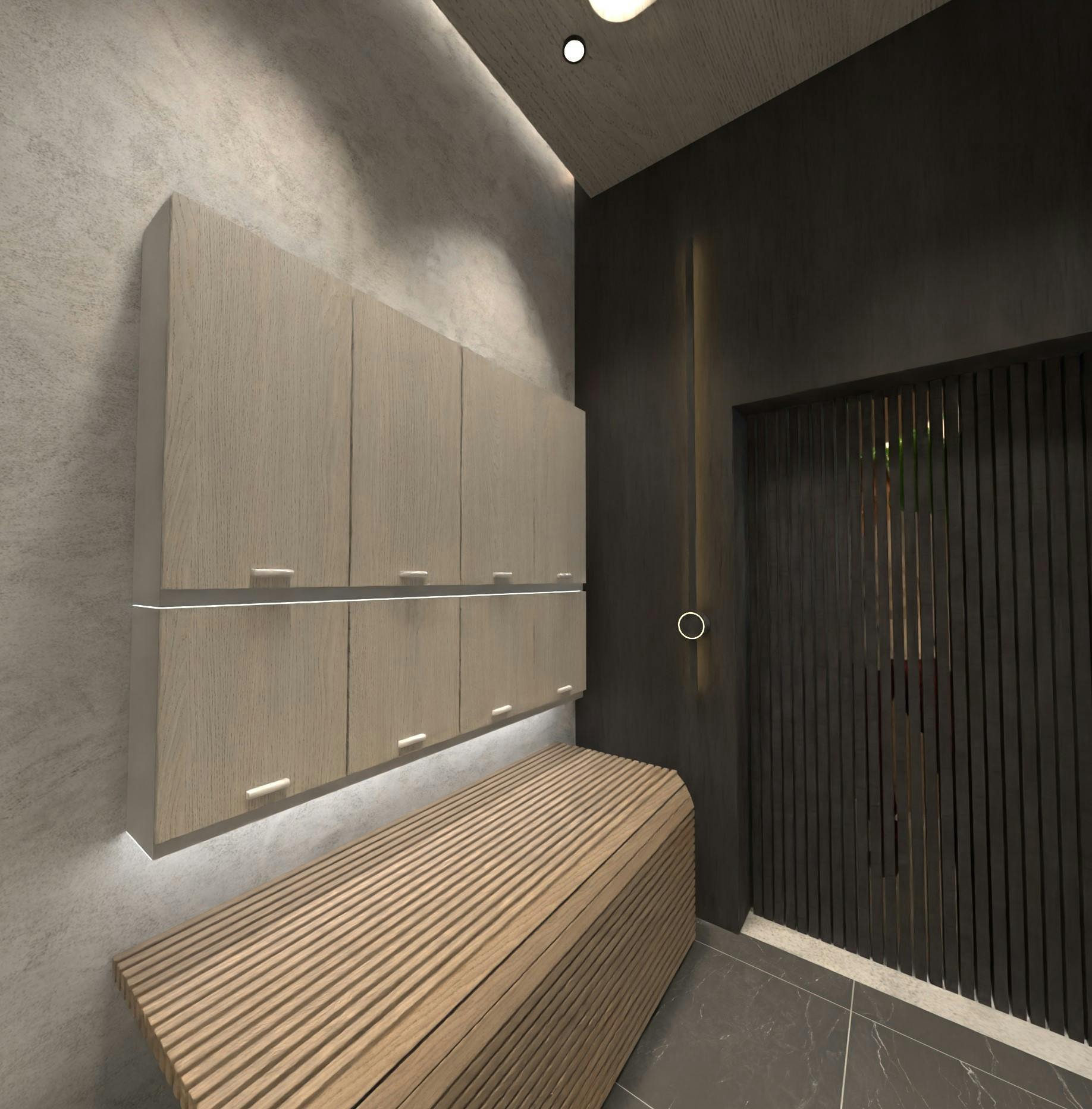 Clean, well-organized changing room with lockers, benches, and soft lighting to provide comfort and privacy for clients.
