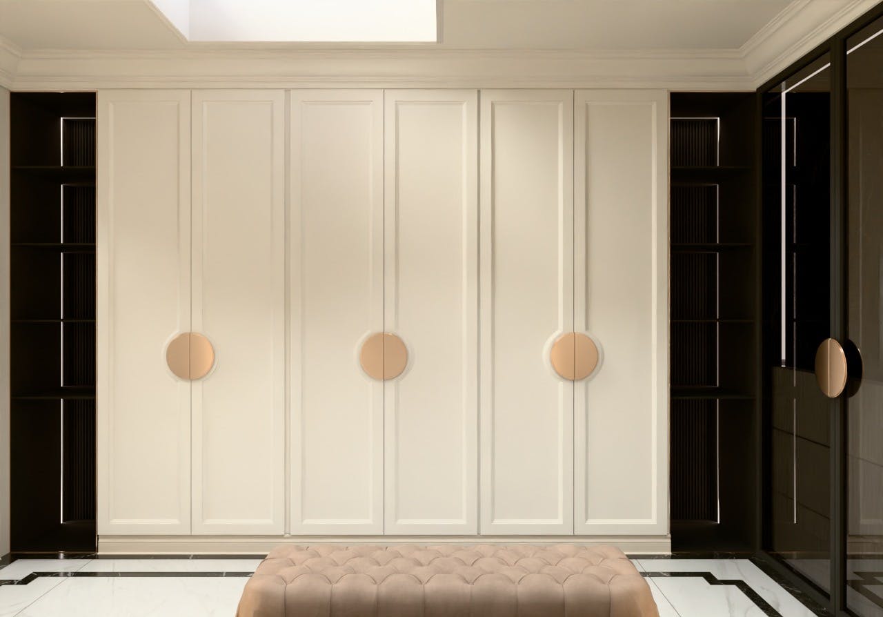 Minimalist walk-in closet with clean built-in storage, soft lighting, and organized open shelving for a refined and functional dressing space.