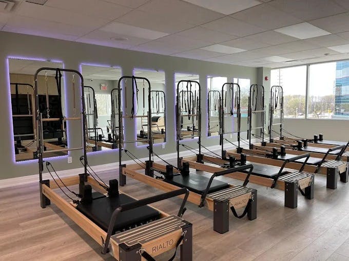 Spacious Cadillac equipment area with clean lines, bright natural lighting, and an uncluttered setup emphasizing precision and calm.