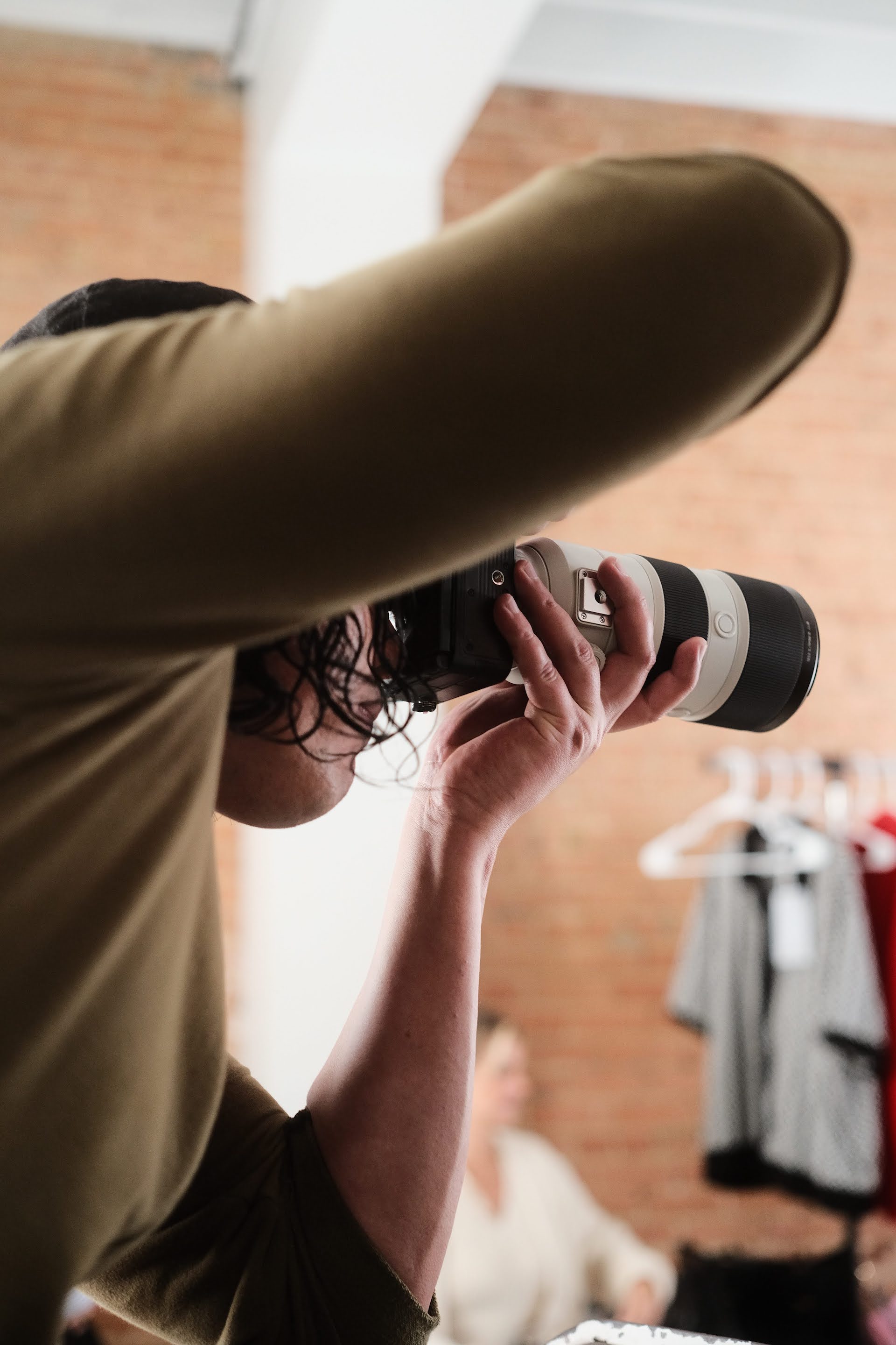 photographer taking photos with a camera