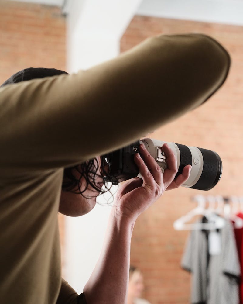 photographer taking photos with a camera
