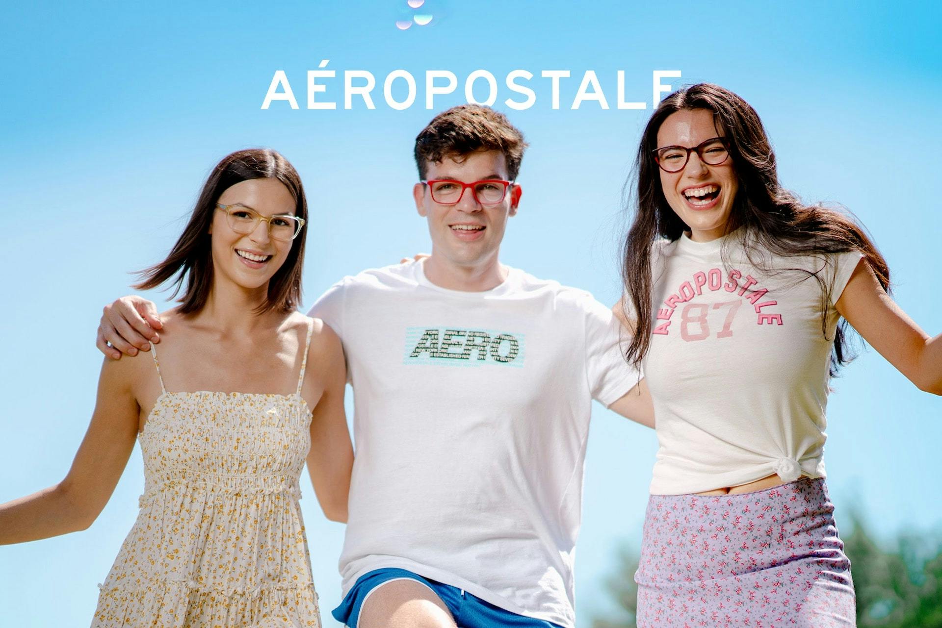 three teens smiling and laughing wearing Aéropostale eyeglasses