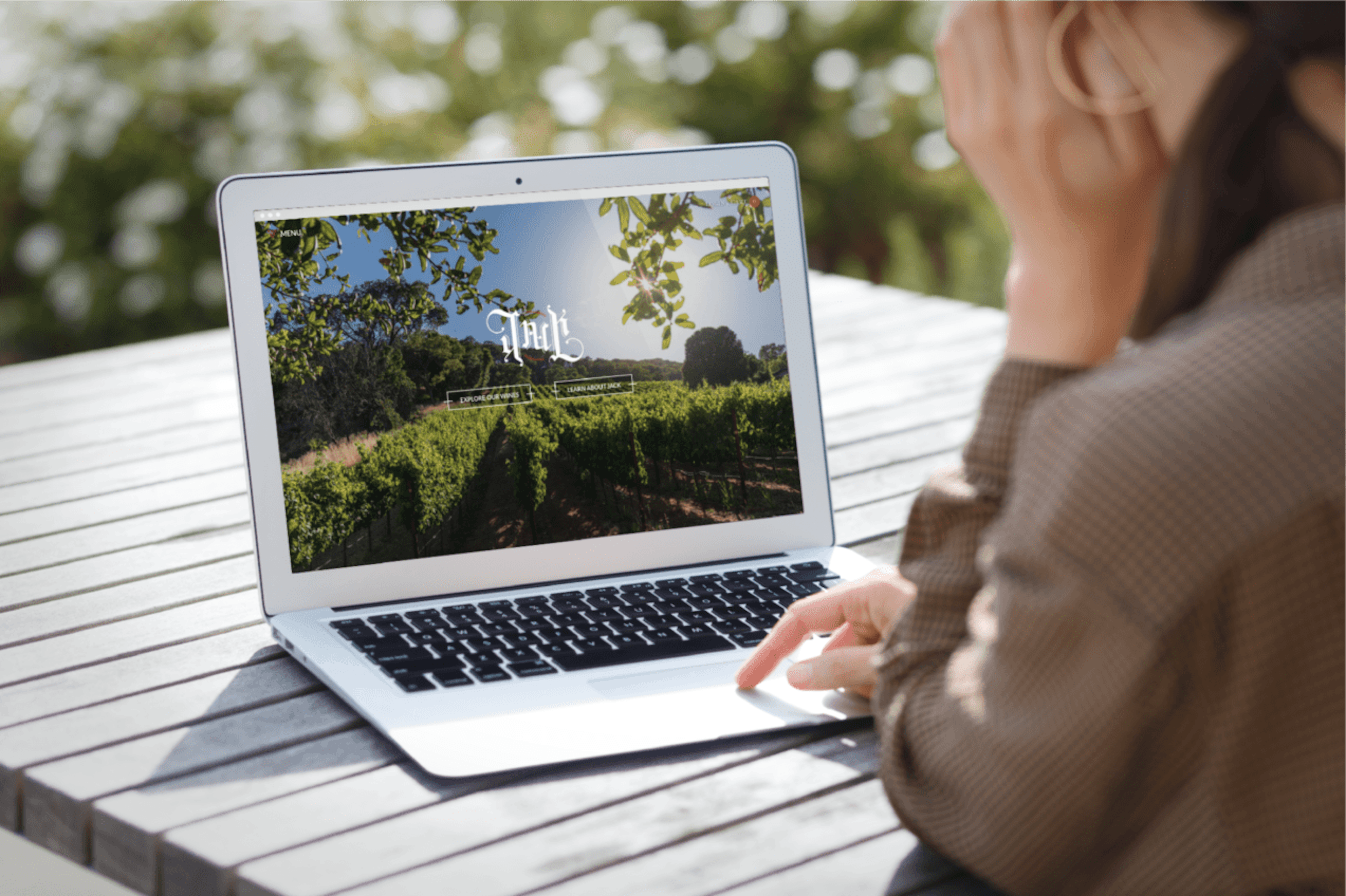 Woman visiting the Jack Wine website homepage