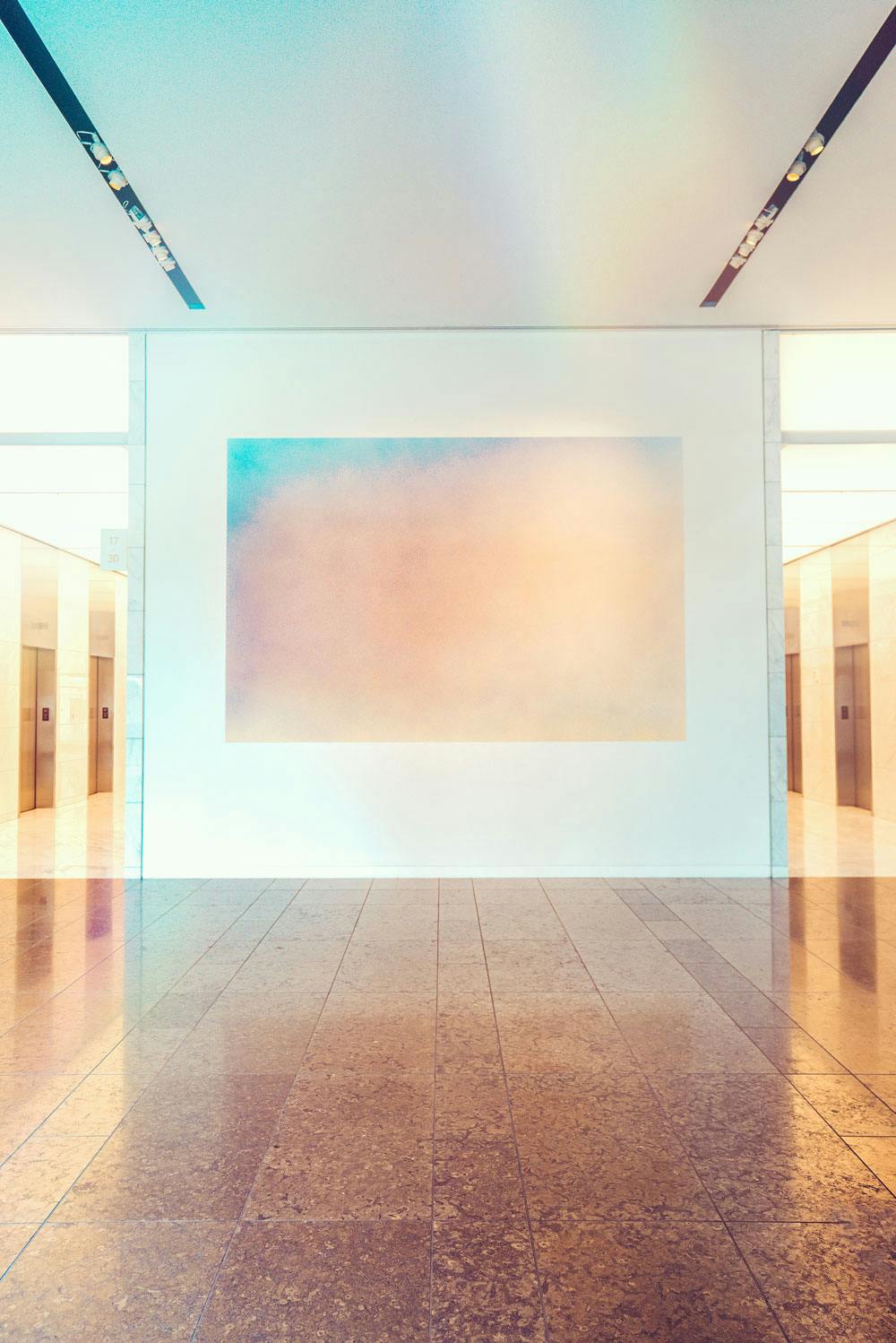 Painting hanging on wall In Santander Tower