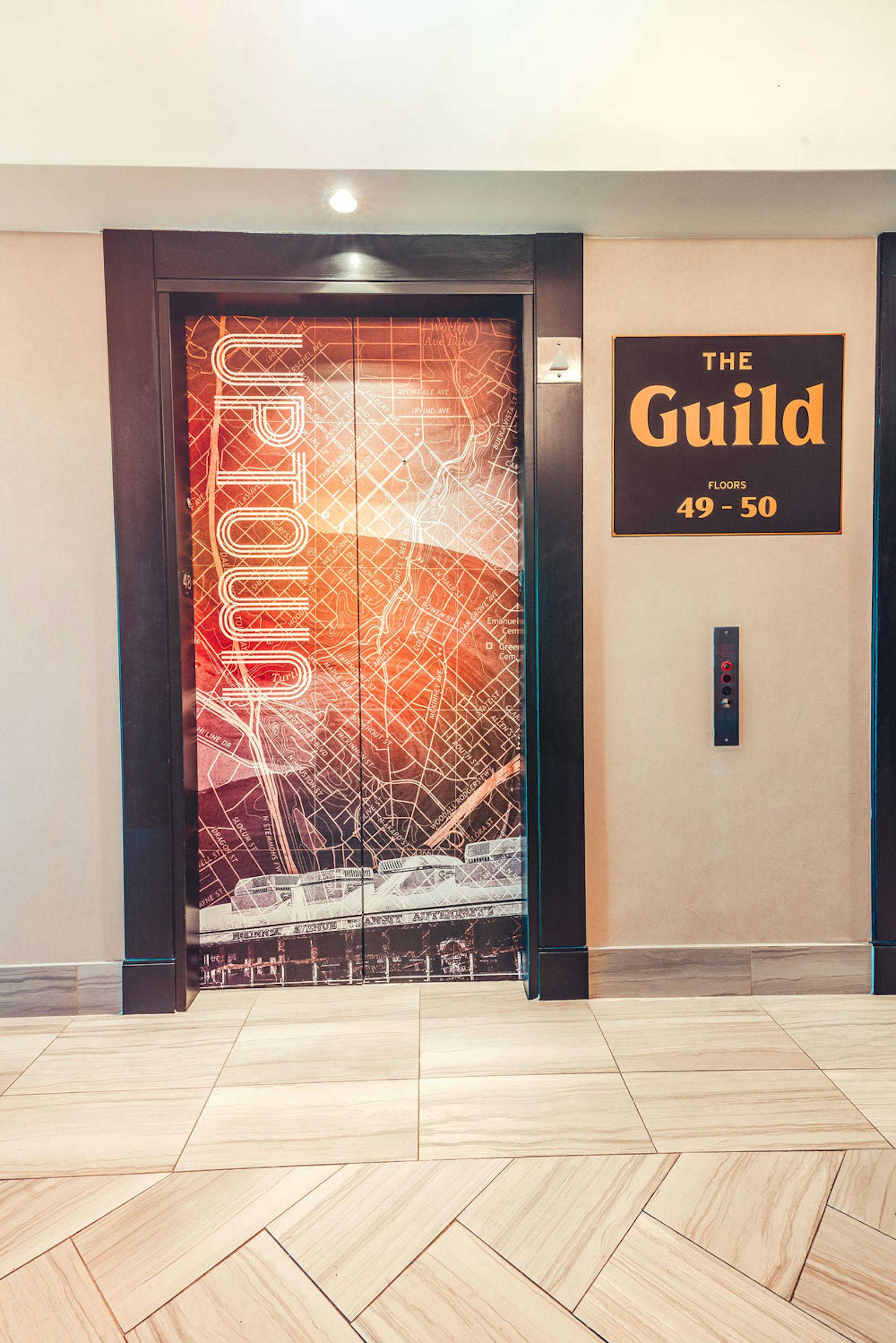 Uptown Dallas sign In The Guild Lobby Inside Santander Tower