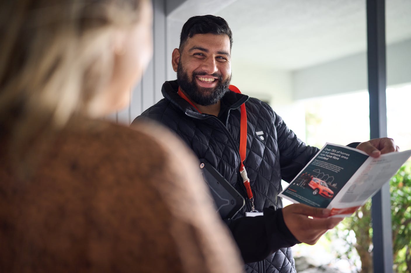 Photo of Fibre Connect Team member explaining photo to customer