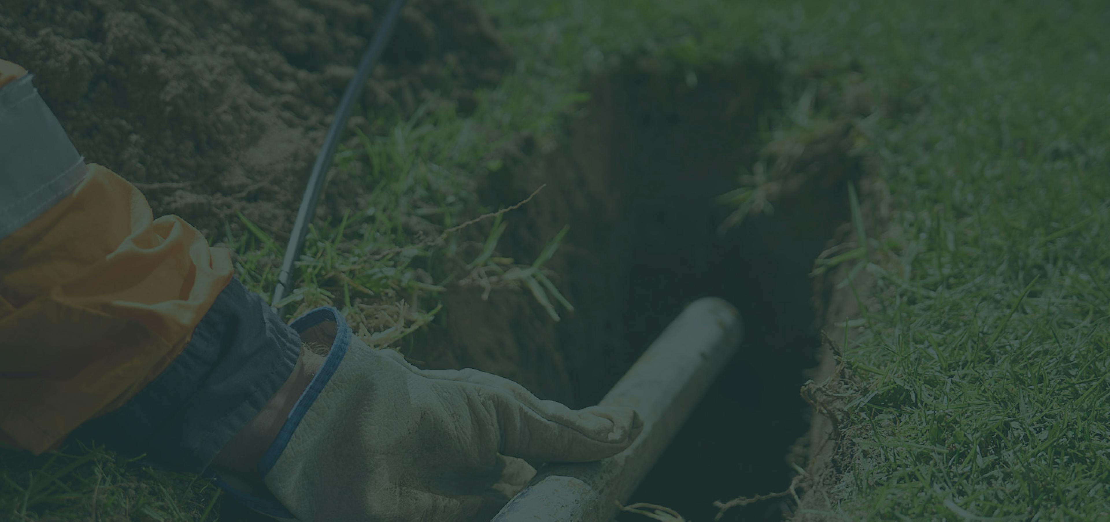 Photo of man installing fibre duct
