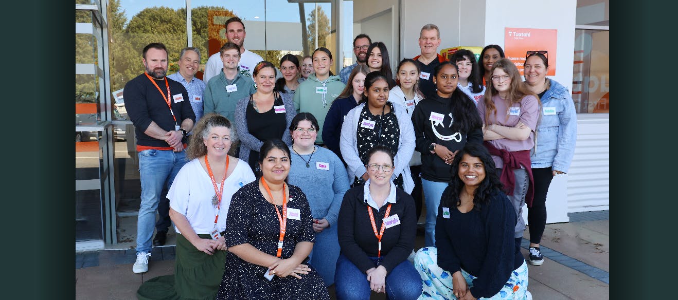 Group photo of Tuatahi Staff with tudents from Te Kuiti High School