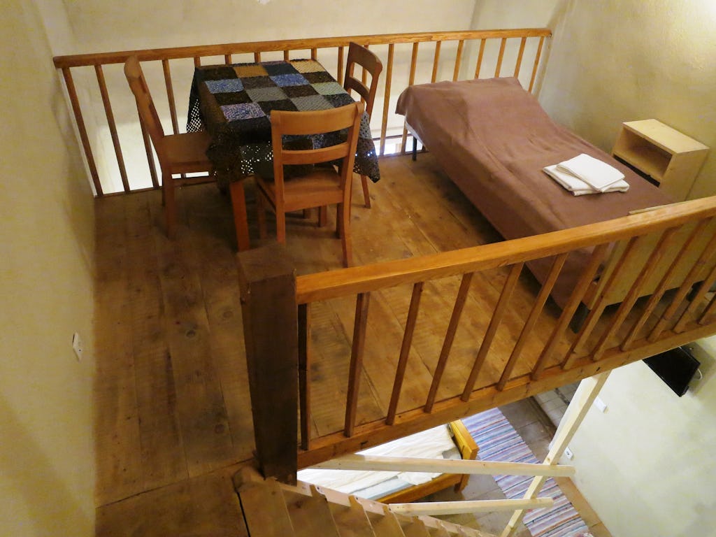 Additional bed on the upper part of the room