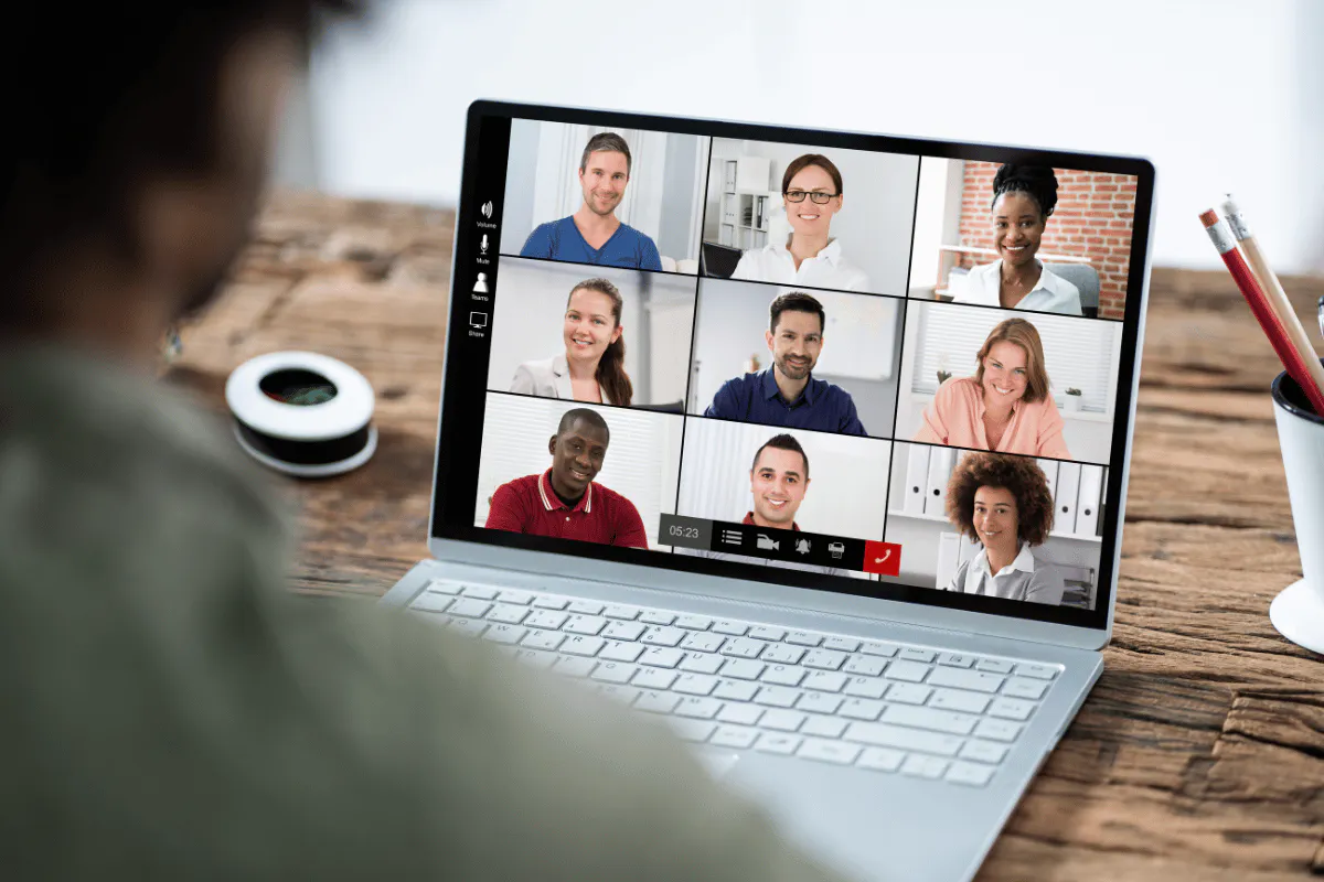 A laptop showing a group call