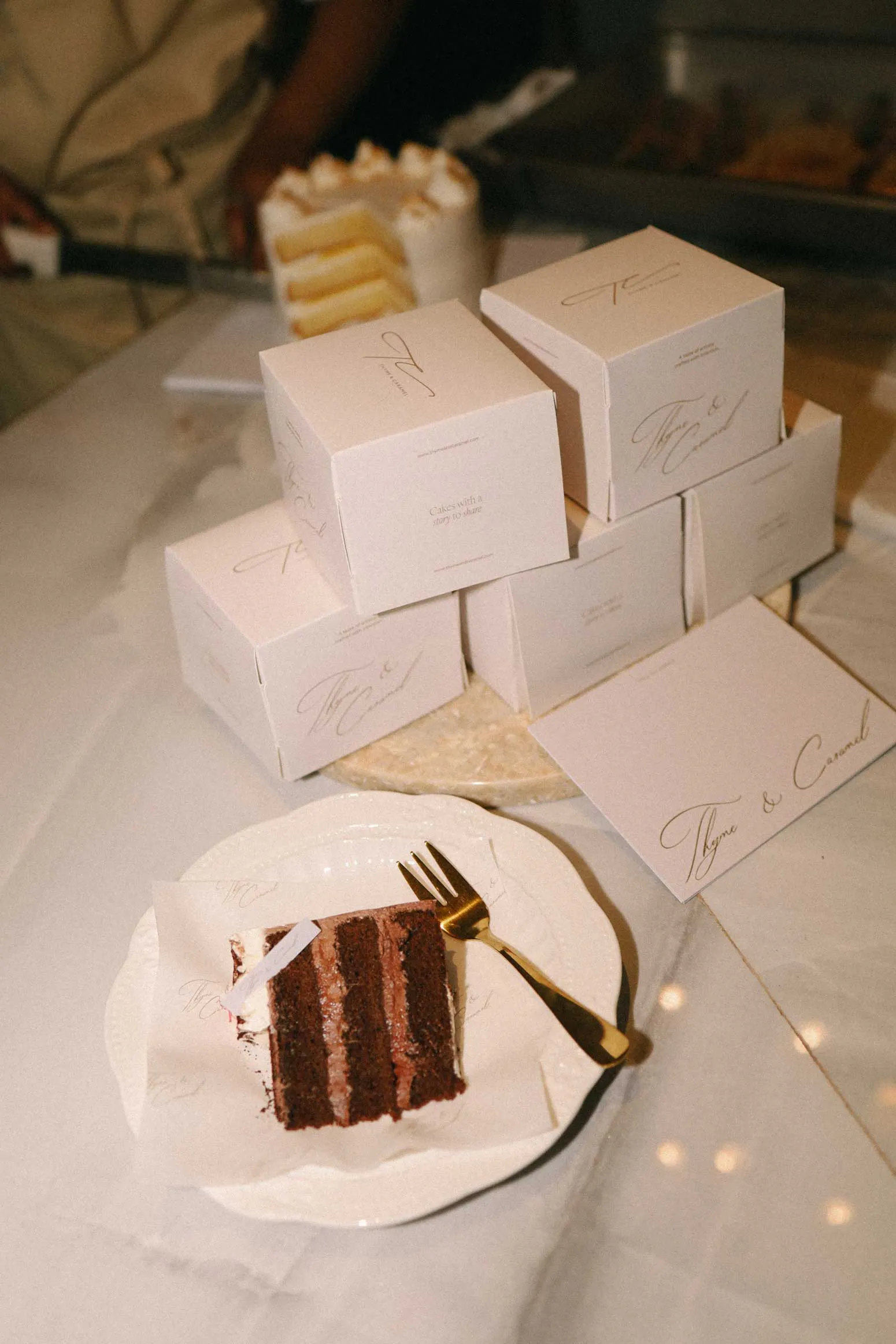 packaging design placed next to delicious looking cake