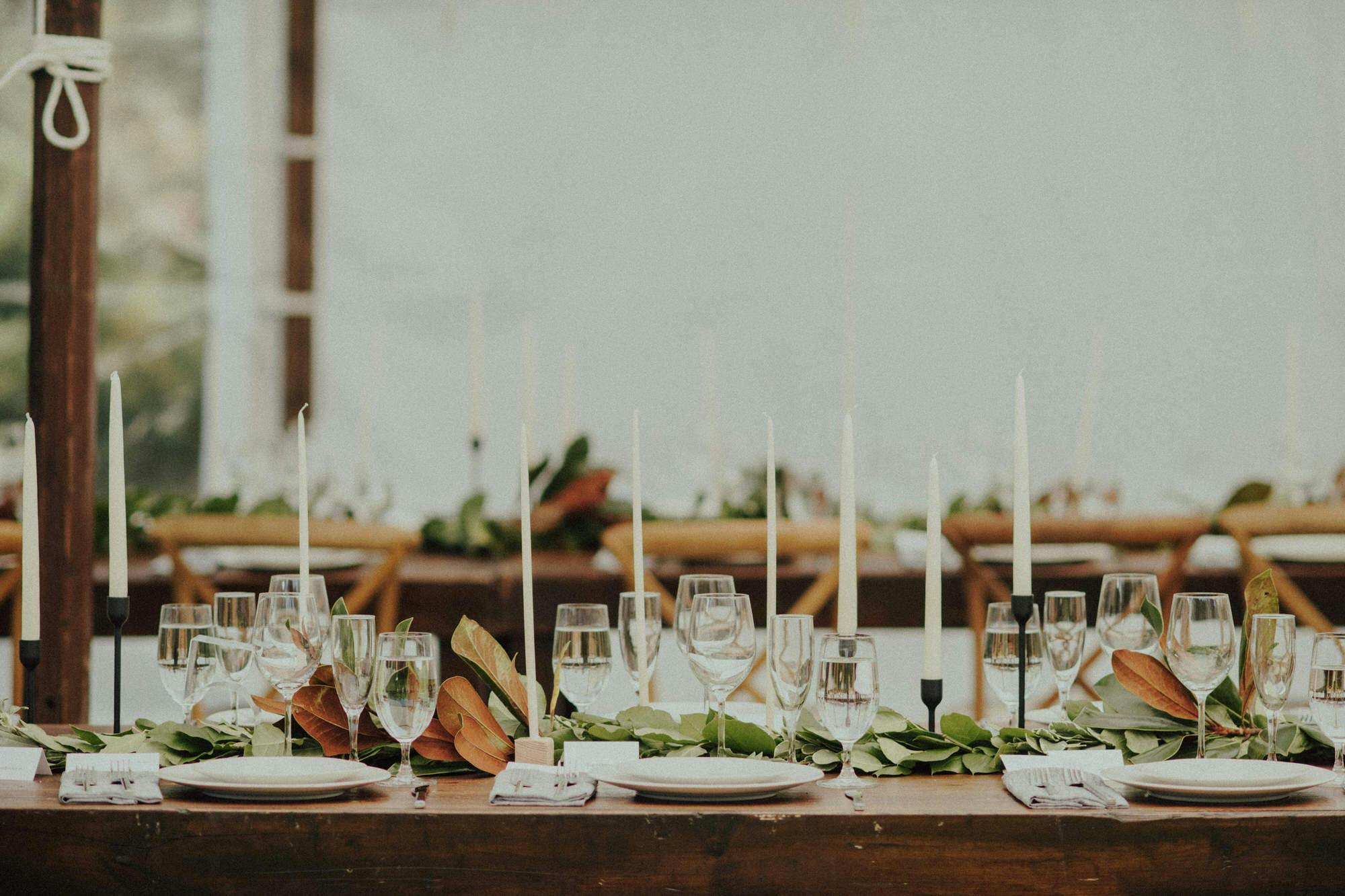 details of candles and florals on tabletop