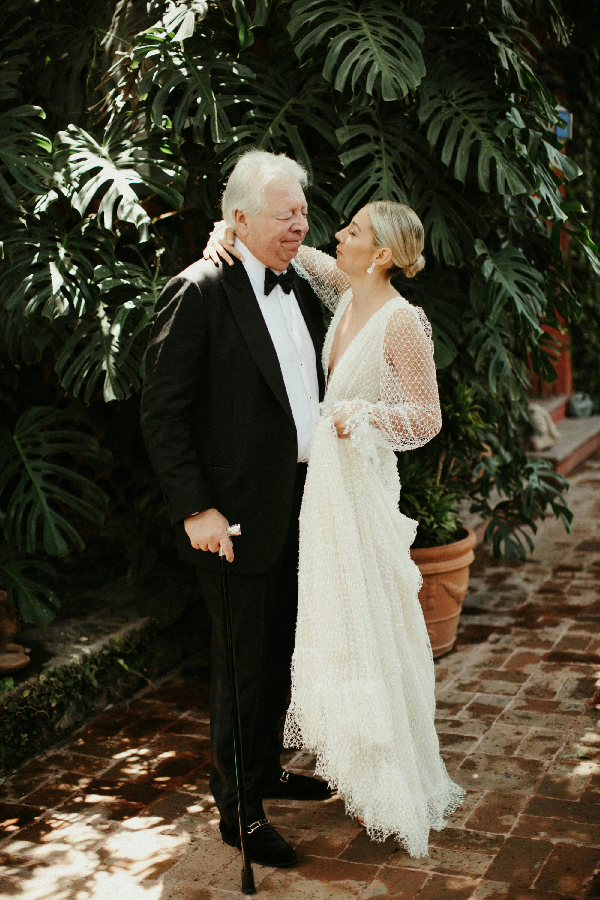 documentary style wedding photography of father daughter first look