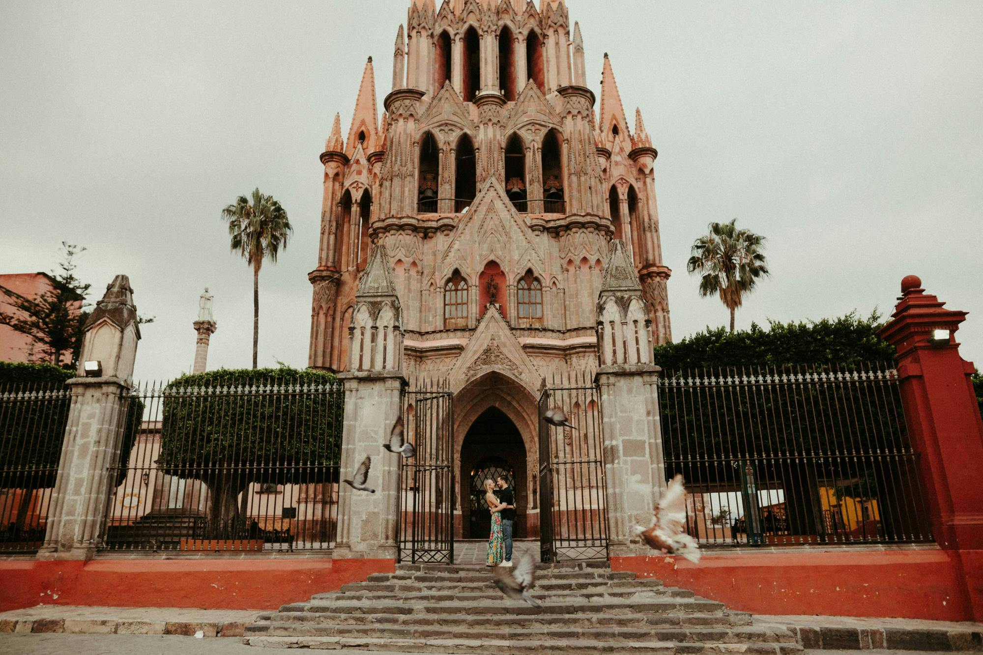 pink church in san miguel engagement photos