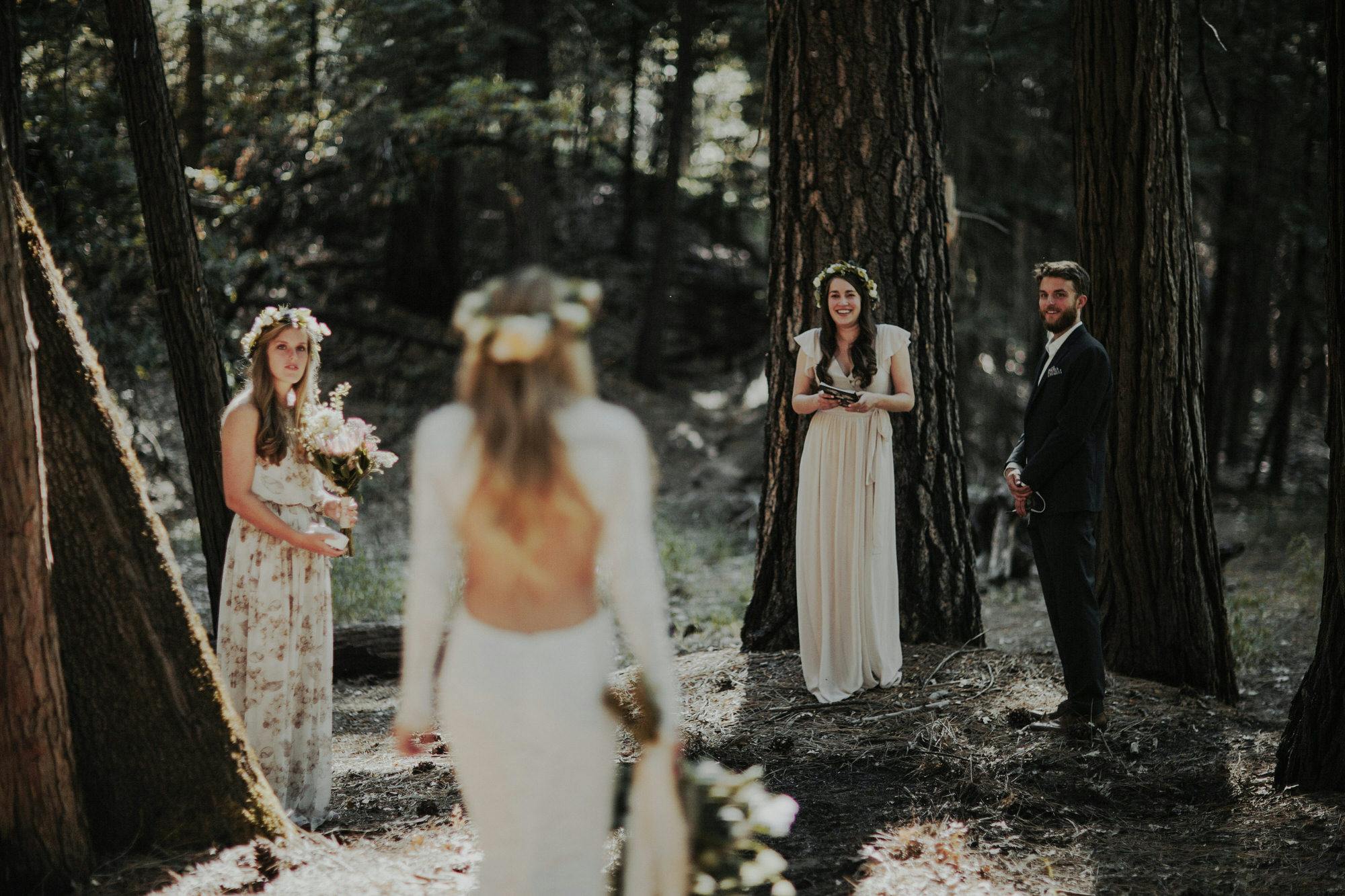 bride walking down the aisle at intimate elopement in yosemite