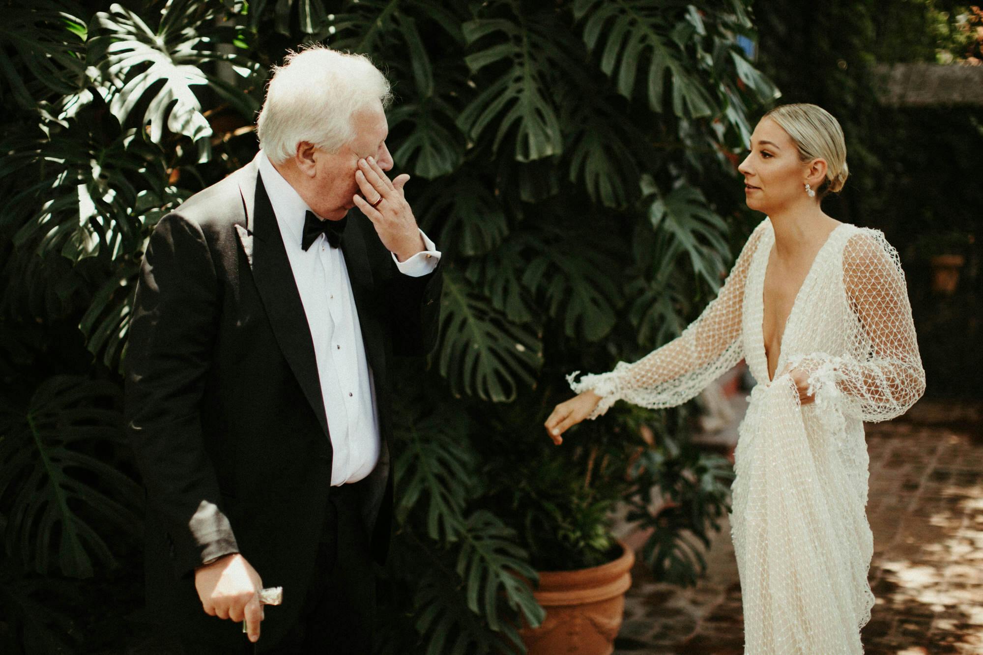 father of bride crying seeing his daughter for first time