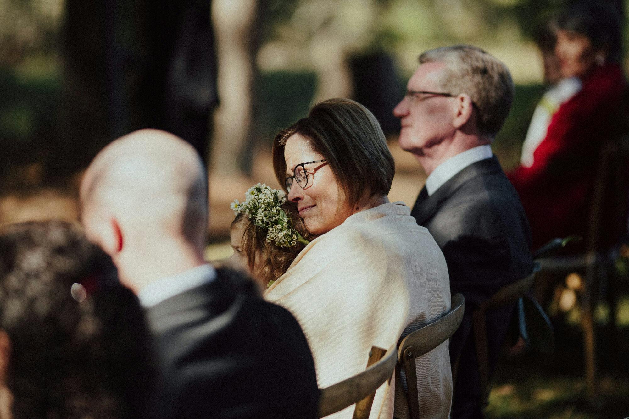 mother of bride emotional during ceremony
